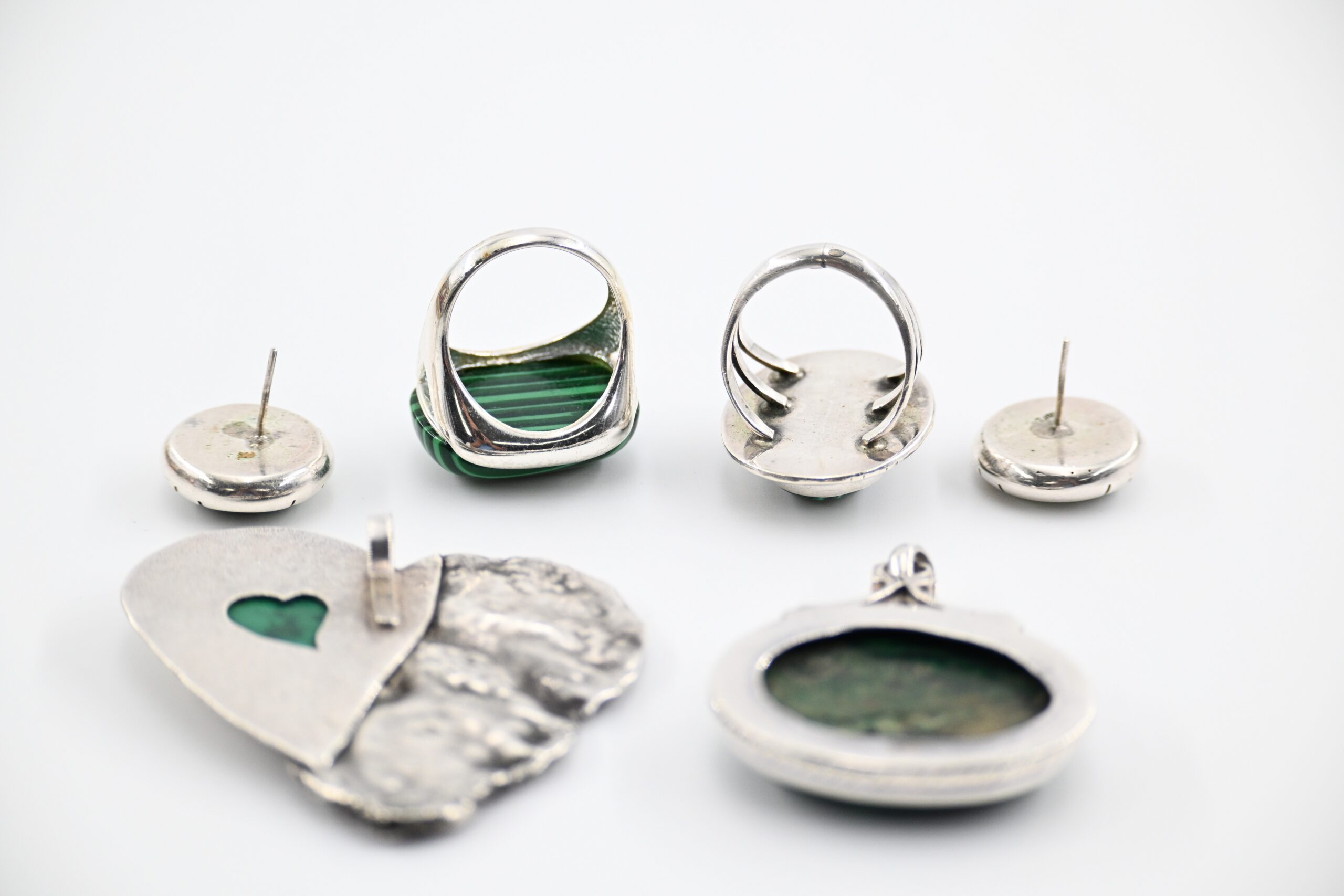 Sterling Silver and Malachite Jewelry Group with Two Rings, Pierced Earrings, and Two Pendants - Image 4