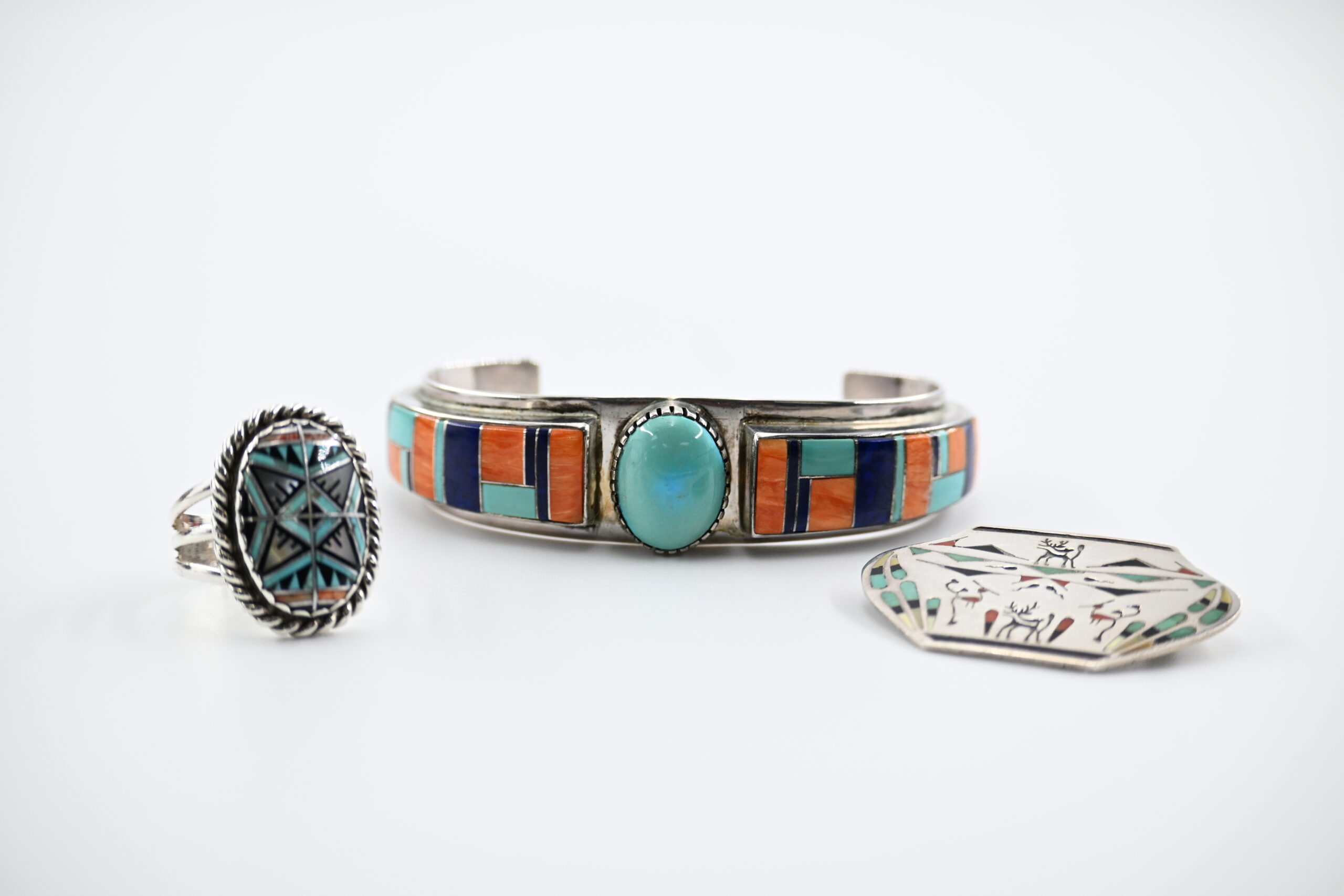 Three-Piece Native American Sterling Silver and Multi-Stone Inlay Group with Cuff, Ring, and Pin