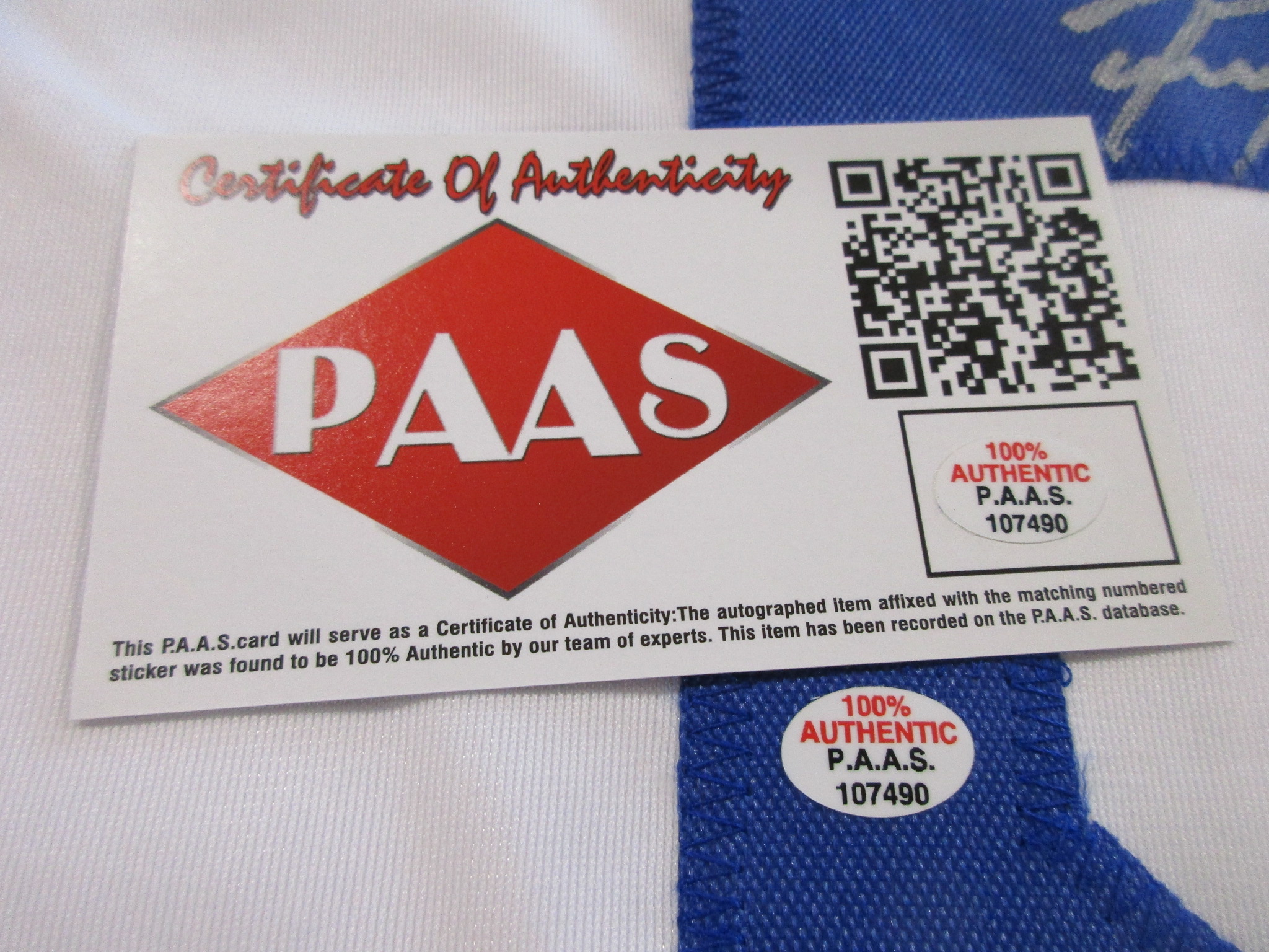 PAAS Certificate of Authenticity card with matching numbered hologram sticker for the autographed jersey