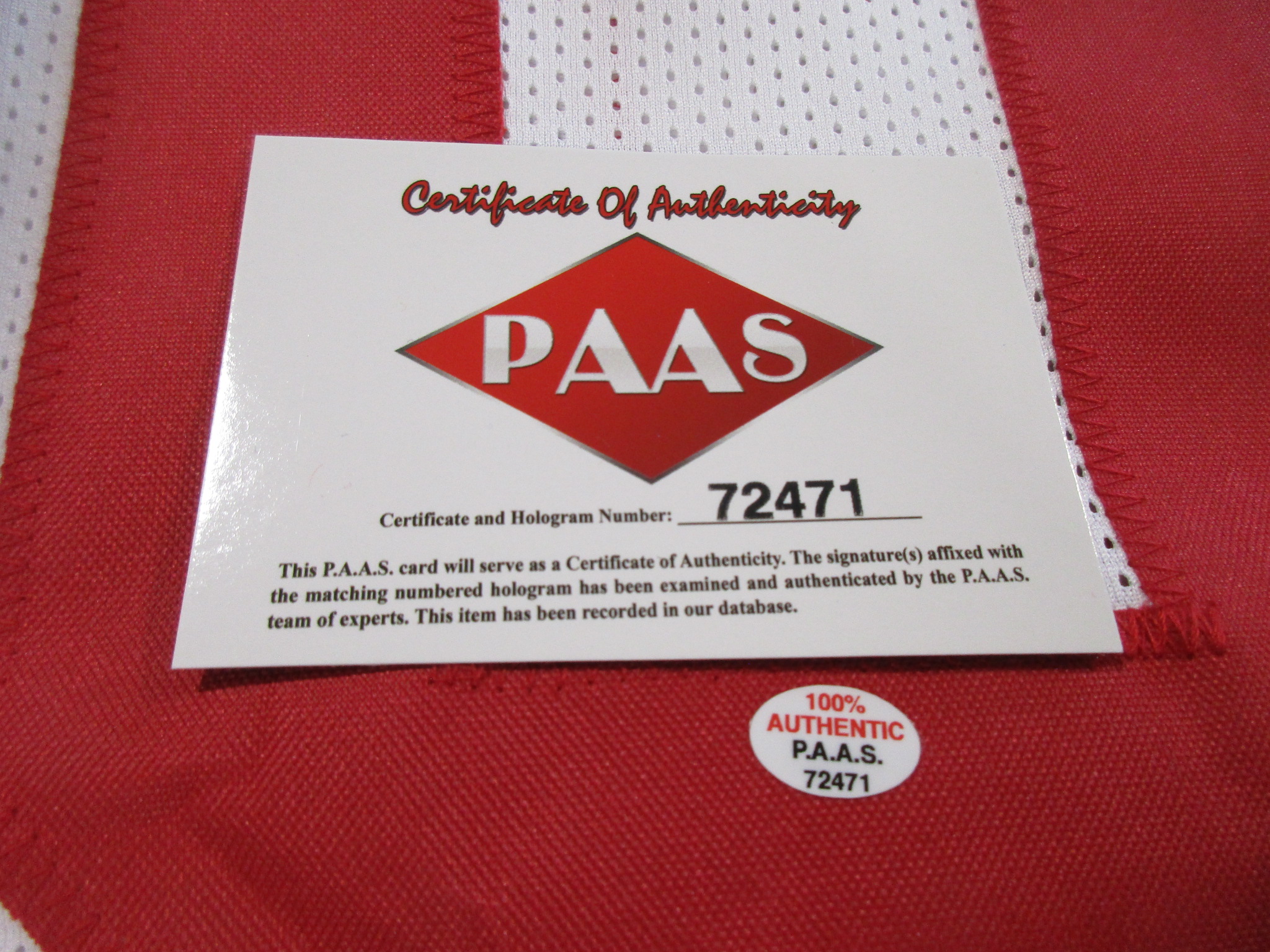 P.A.A.S. Certificate of Authenticity card and matching hologram sticker sewn inside the jersey