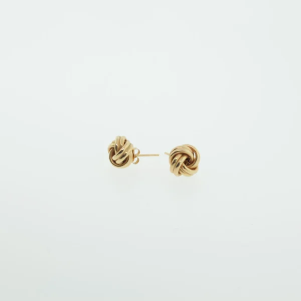 Pair of gold-tone love-knot stud earrings shown from the side against a white background