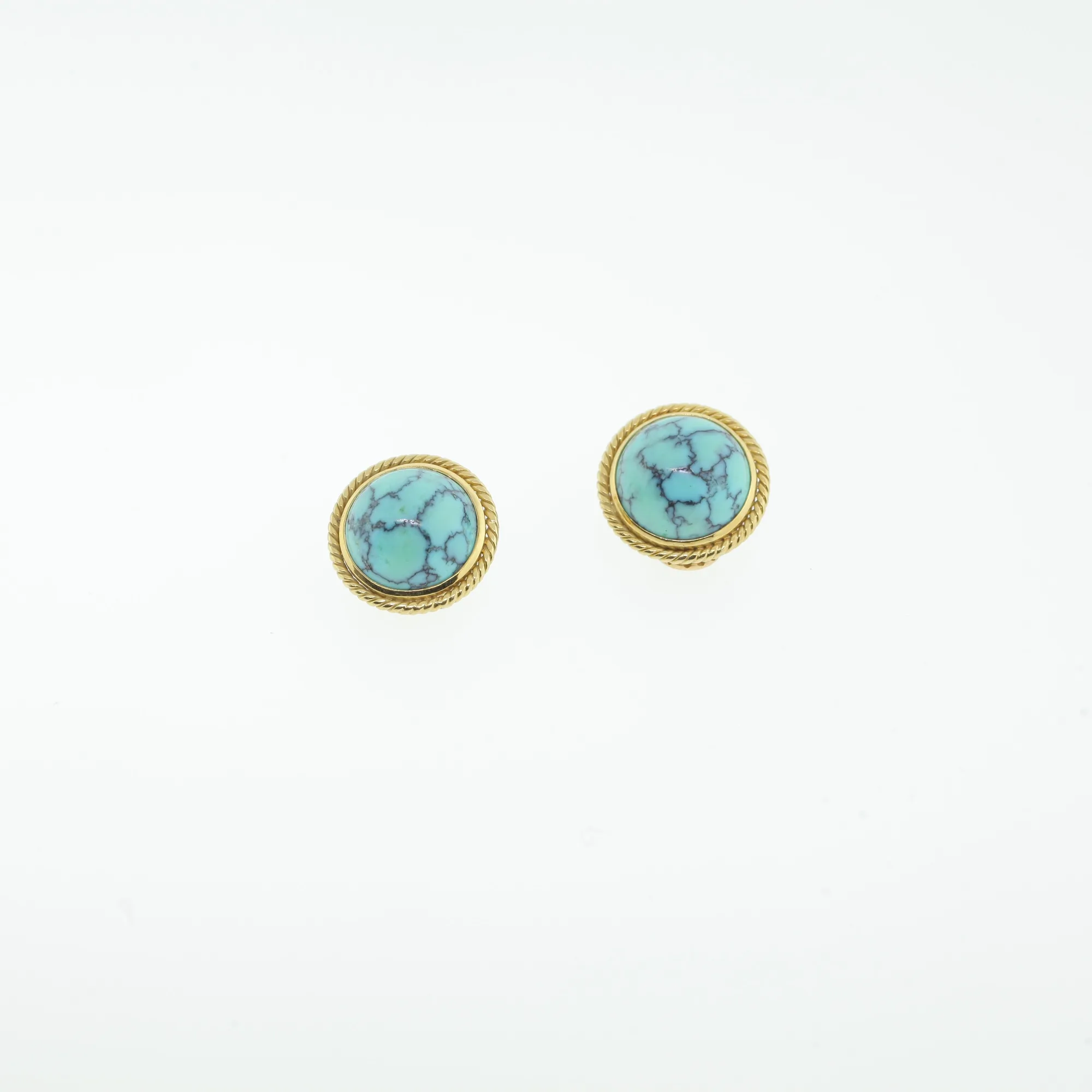 Overhead close-up view of both earrings showing matrix veining in the stones