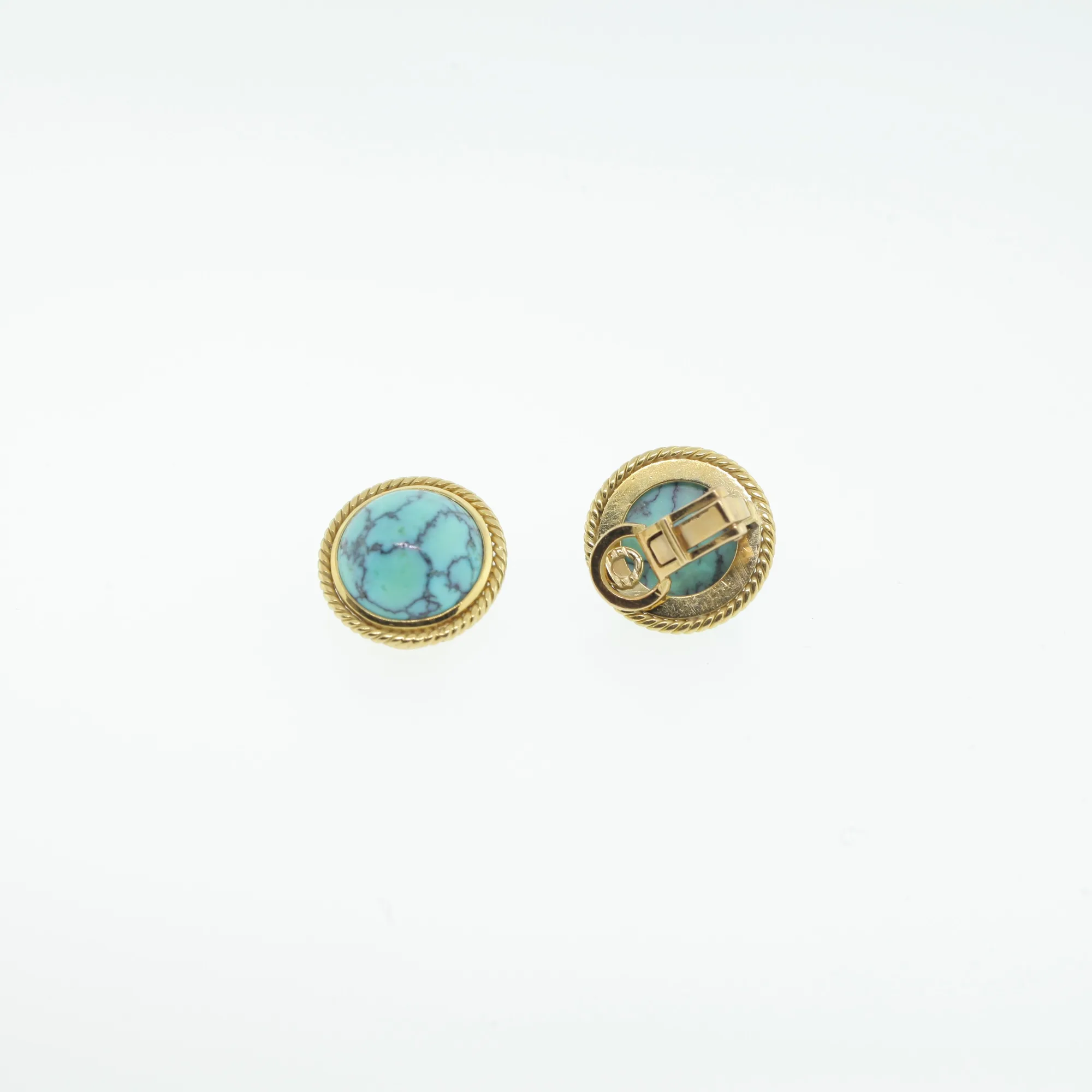 Back view of both earrings laid flat, showing gold-tone clip hardware