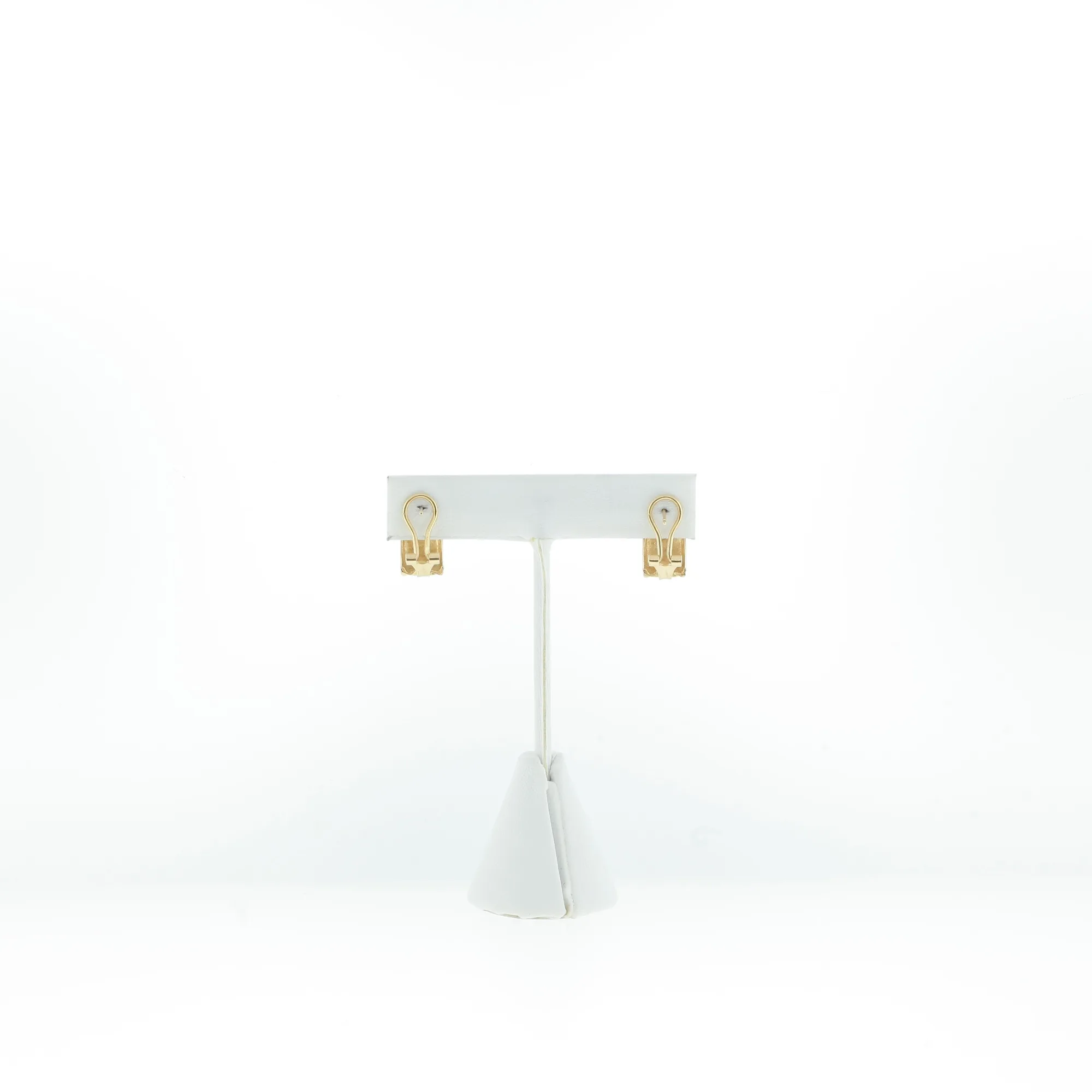 Detail view of the omega clip backs alone, mounted on a white display card