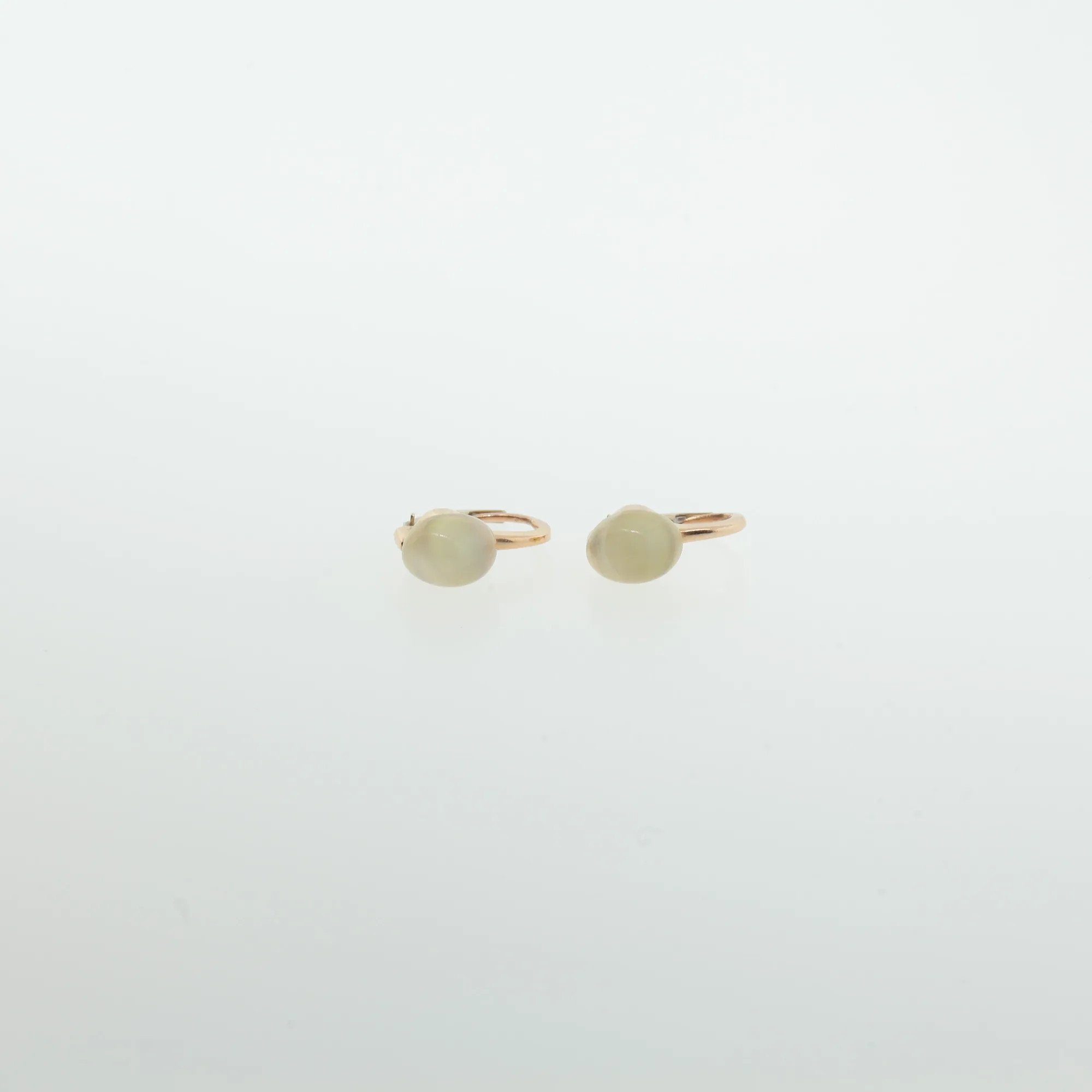 Additional close-up of earring pair showing cabochon stones and hoop clasps