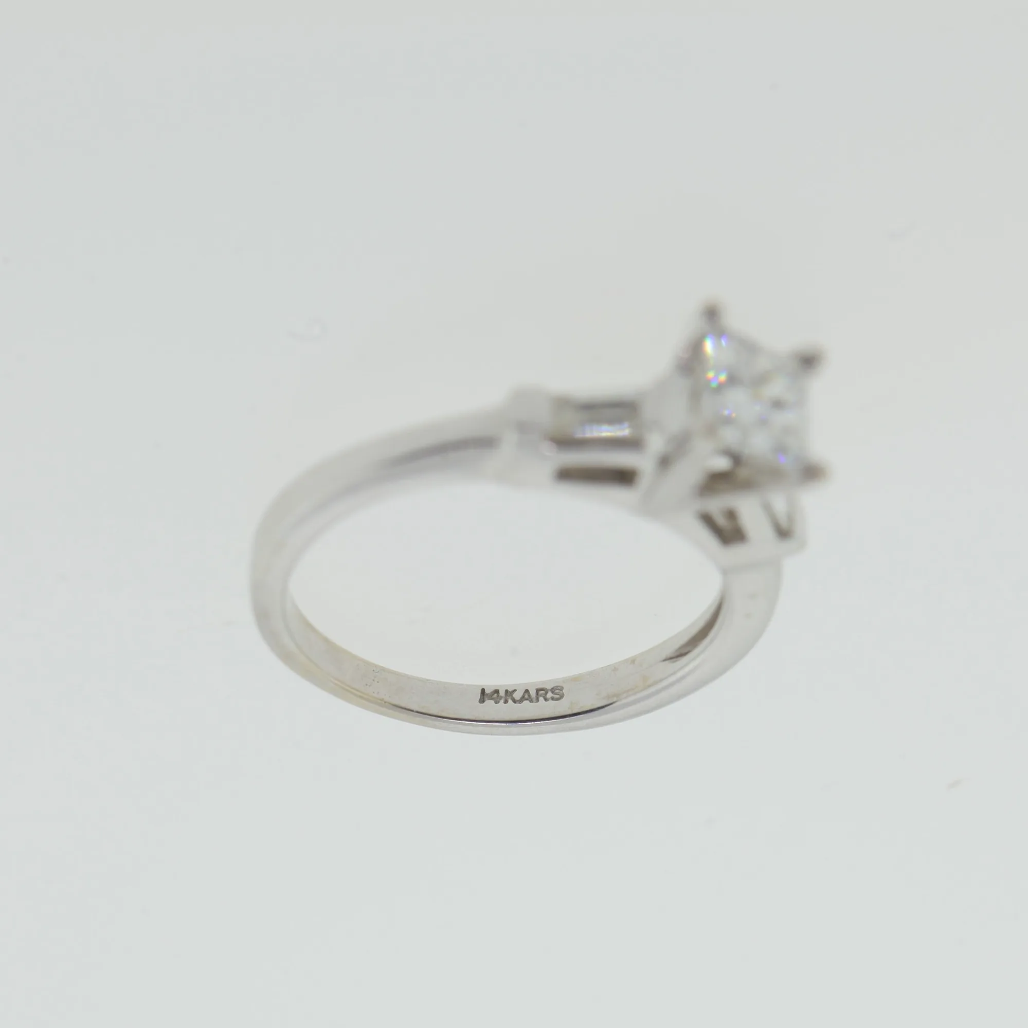 Close-up of the ring's interior band showing the stamped 14KARS hallmark