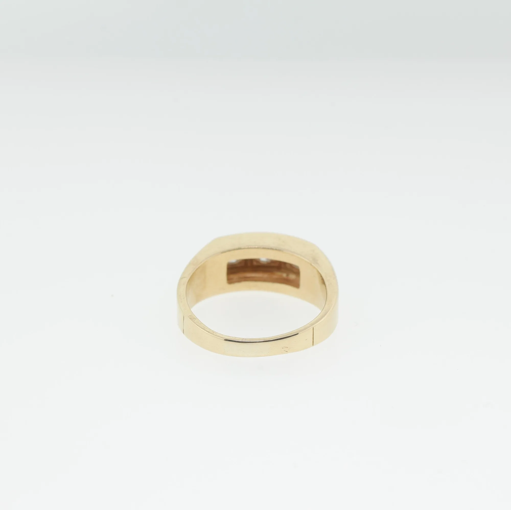 Top-down interior view of the ring highlighting the hallmark and band construction