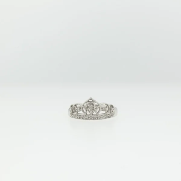 Front view of a white metal crown-style ring with pavé-set clear stones