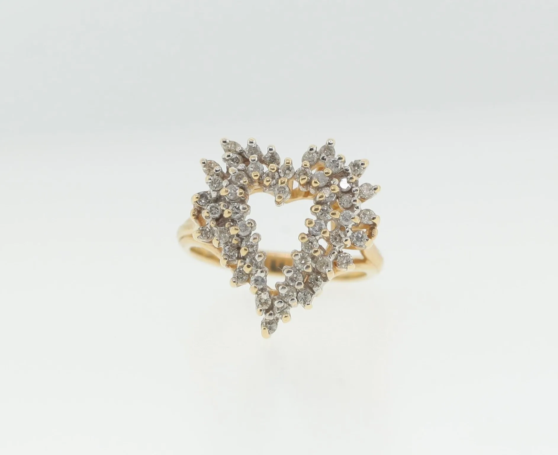 Close-up front view highlighting the tiered rows of faceted stones forming the heart outline