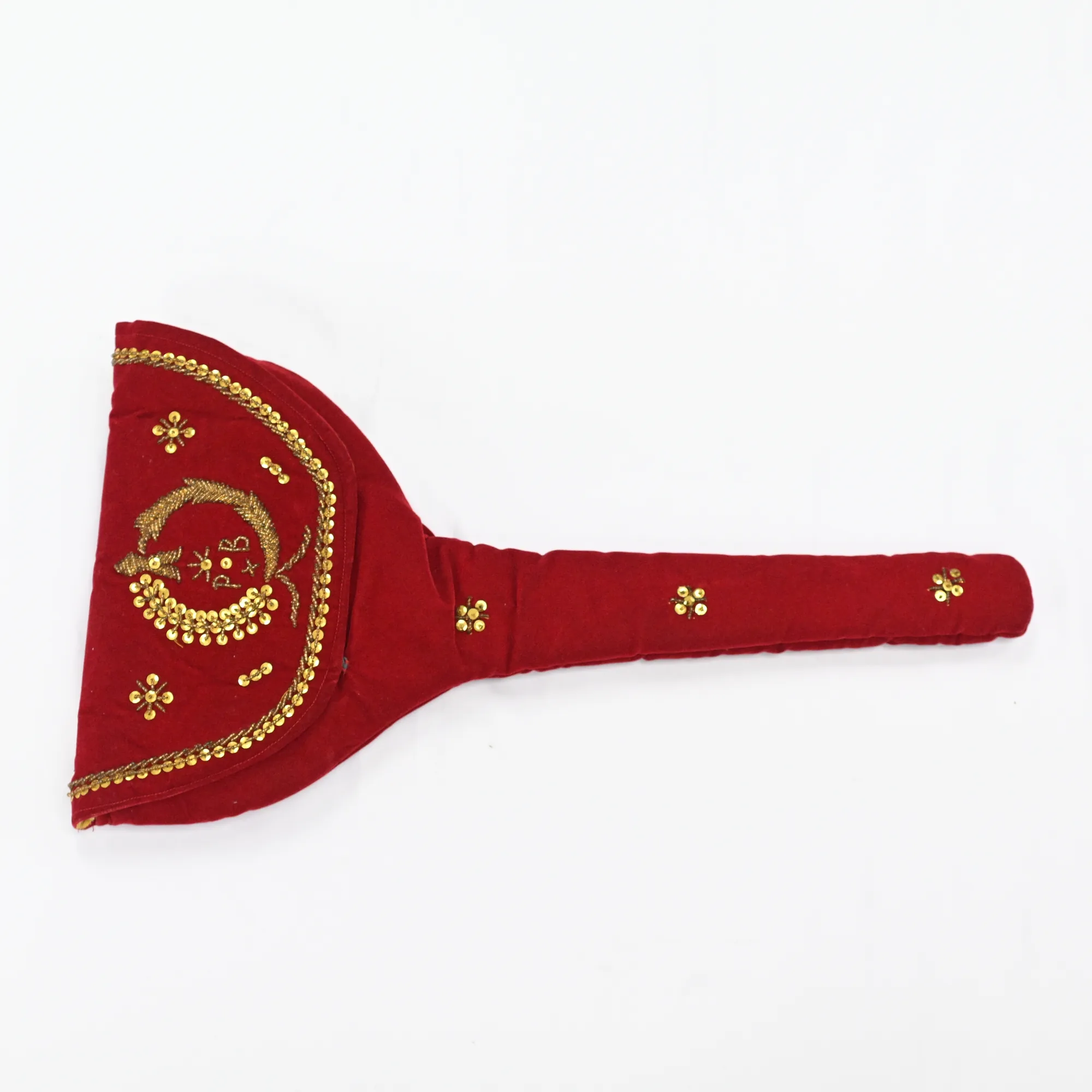 Red velvet cover with gold-tone embroidered crescent and star