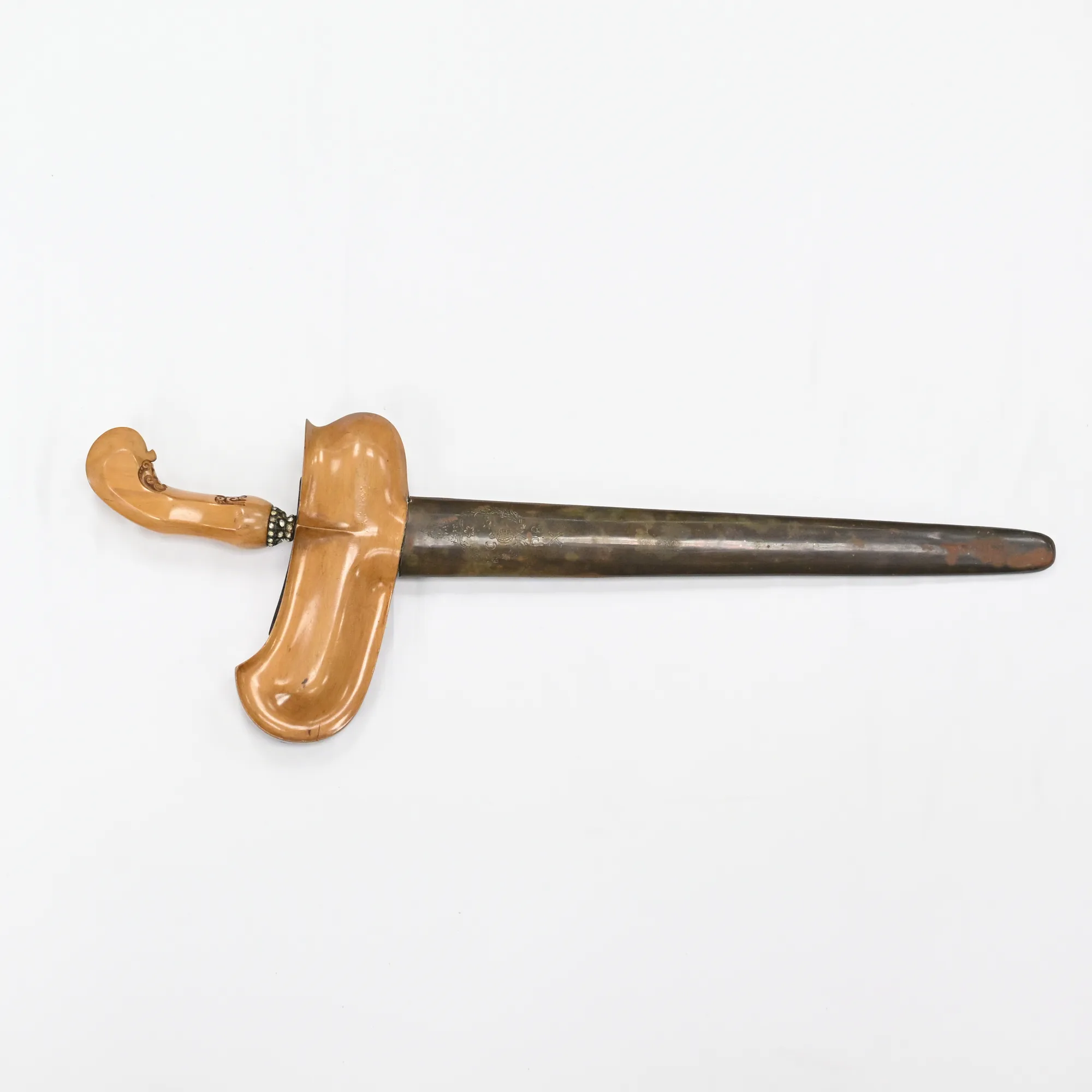 Keris dagger in its sheath, other side