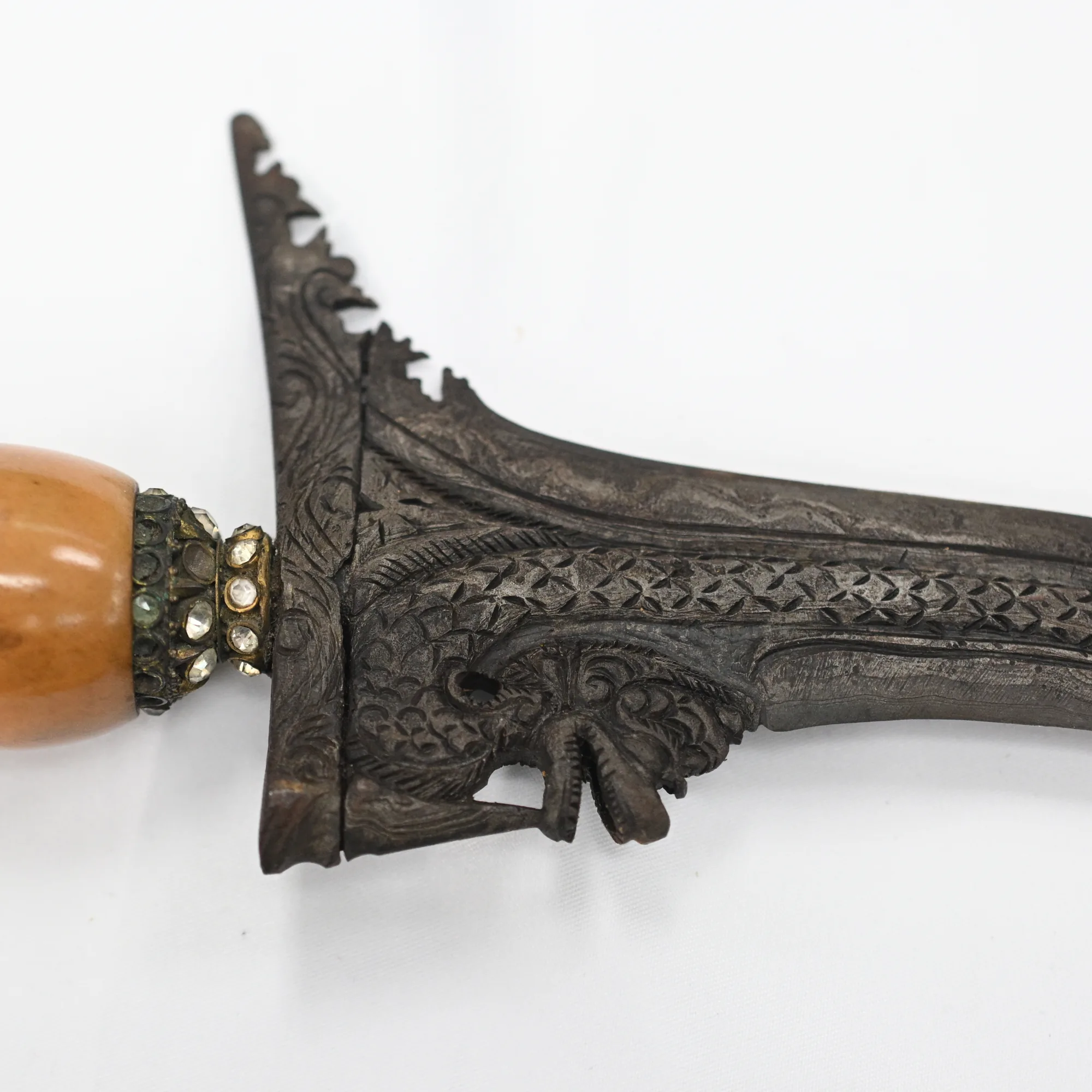 Close view of the carved guard from the other side